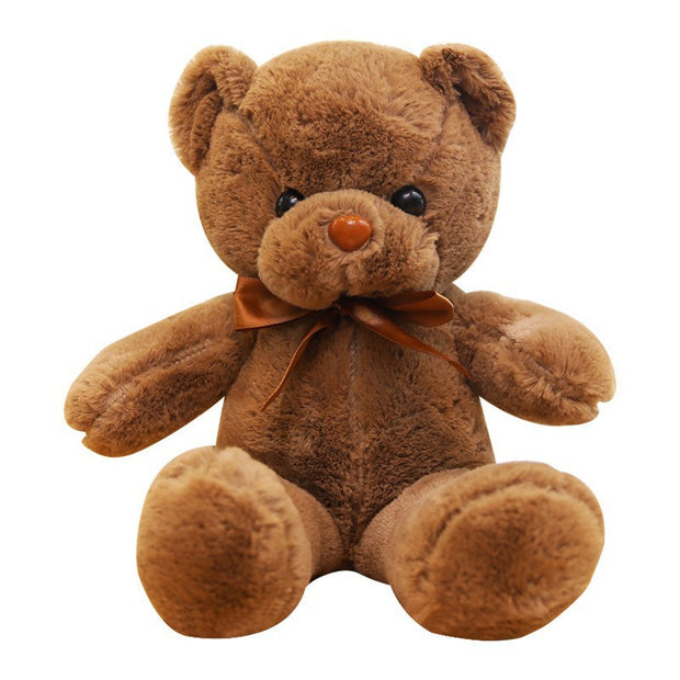 Colorful Bear Doll Plush Toys in various shades including pink, blue, purple, and green displayed on shelves and a chair, perfect for gifting or cuddling.