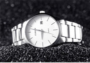 Luxury Analog Business Wristwatch with black dial and silver stainless steel band, ideal for men's fashion and formal wear.