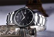 Luxury Analog Business Wristwatch with black dial and silver stainless steel band, ideal for men's fashion and formal wear.